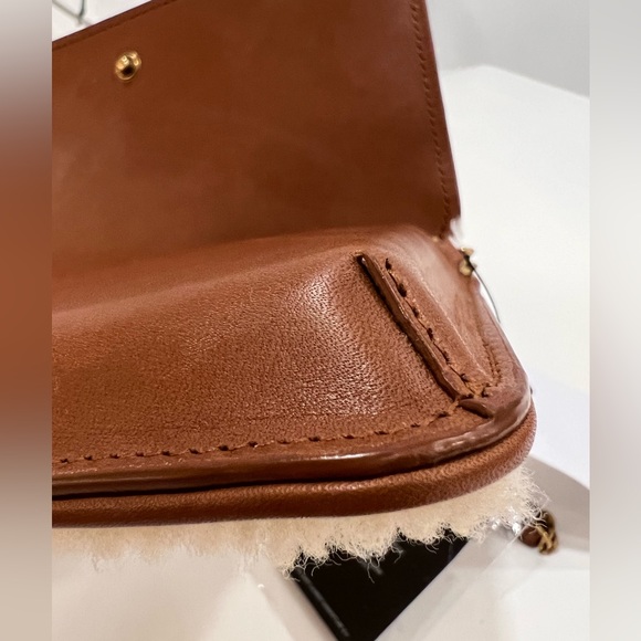 SAINT LAURENT Monogram shearling-paneled wallet on chain - Picture 12 of 12